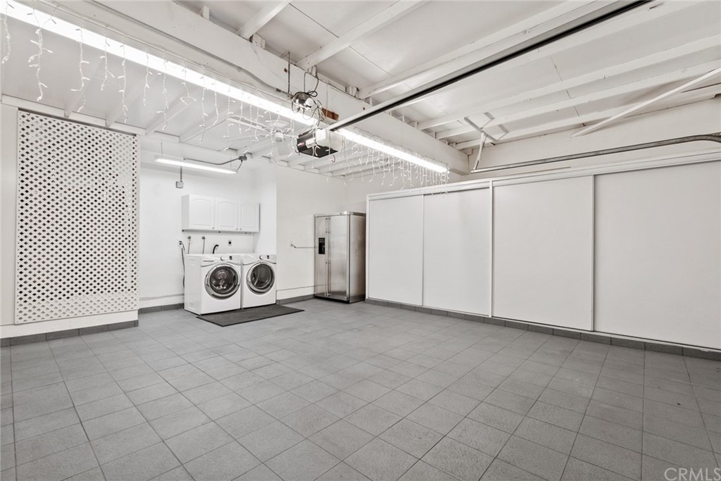 5 Elderwood, Unit 19 Irvine, CA 92614 - Photo 37 of 39 a view of a storage & utility room with a garage