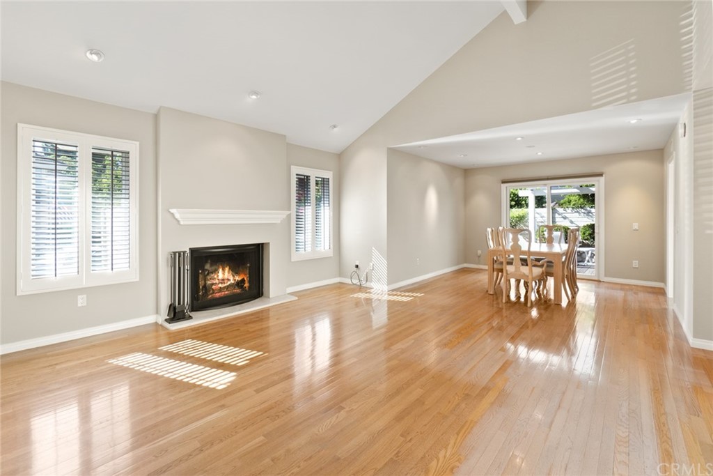 5 Elderwood, Unit 19 Irvine, CA 92614 - Photo 5 of 39 a living room with furniture and a fireplace