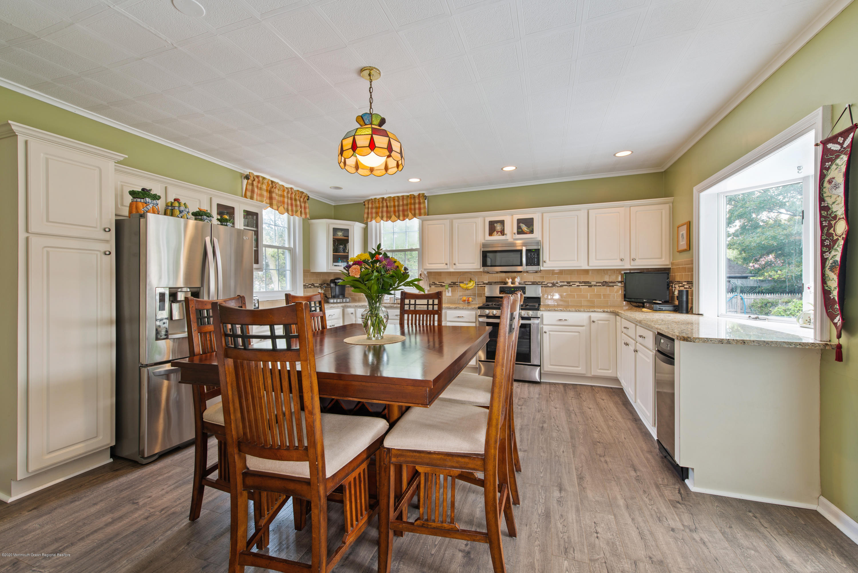 205 Main Street Keyport, NJ 07735 - Photo 12 of 42 a view of a dining room with furniture window and wooden floor