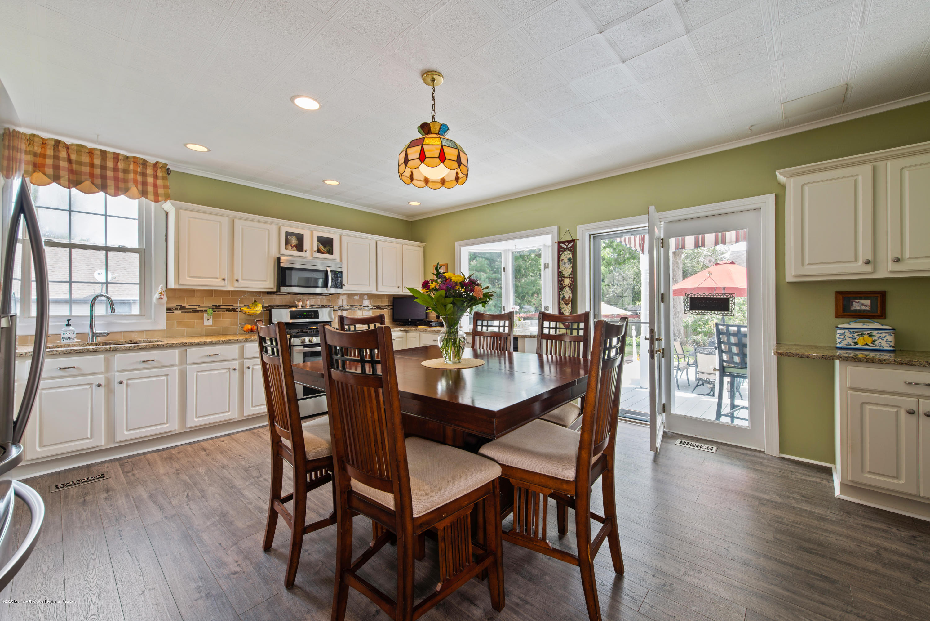 205 Main Street Keyport, NJ 07735 - Photo 13 of 42 a view of a dining room with furniture window and wooden floor