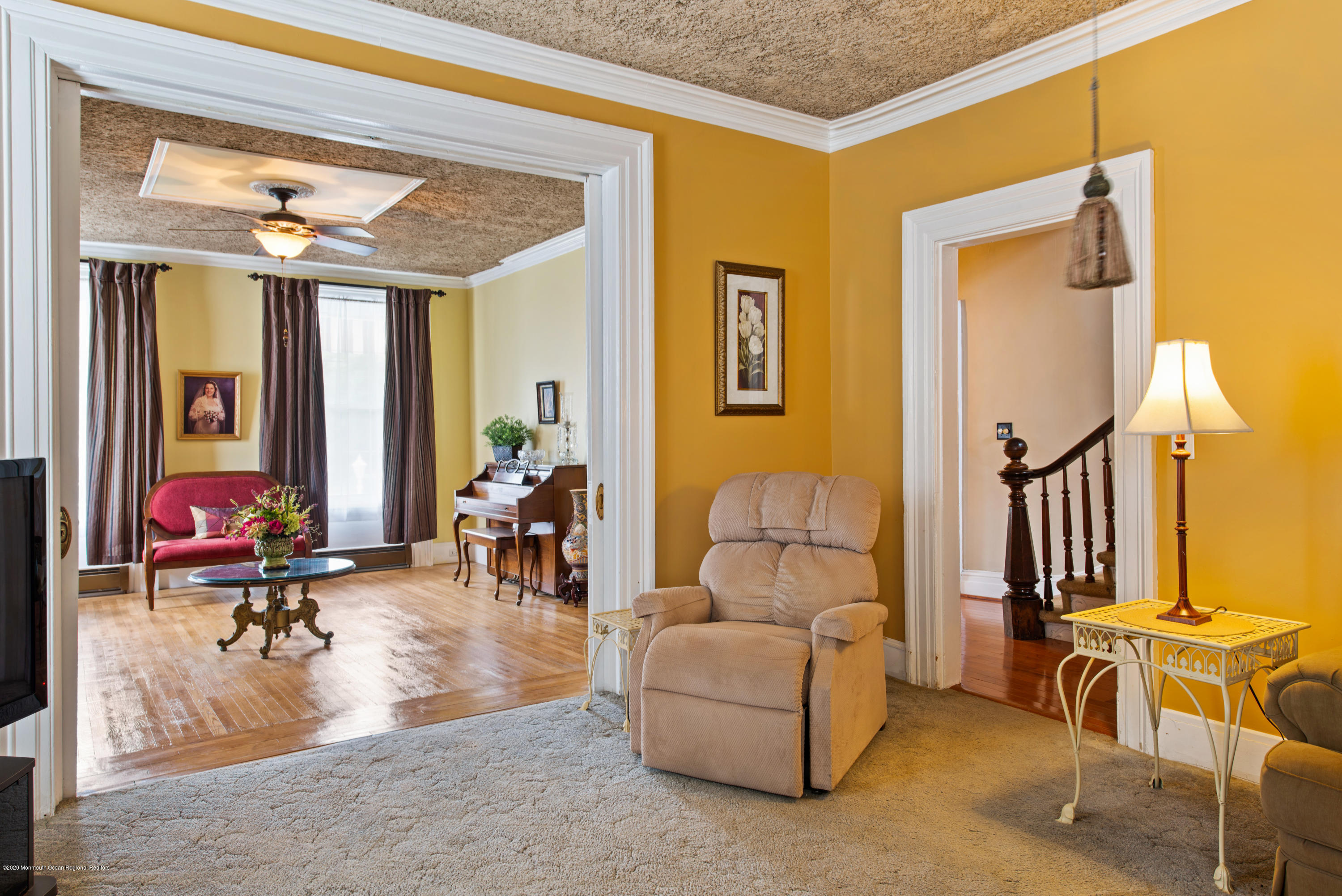 205 Main Street Keyport, NJ 07735 - Photo 16 of 42 a living room with furniture and a large window
