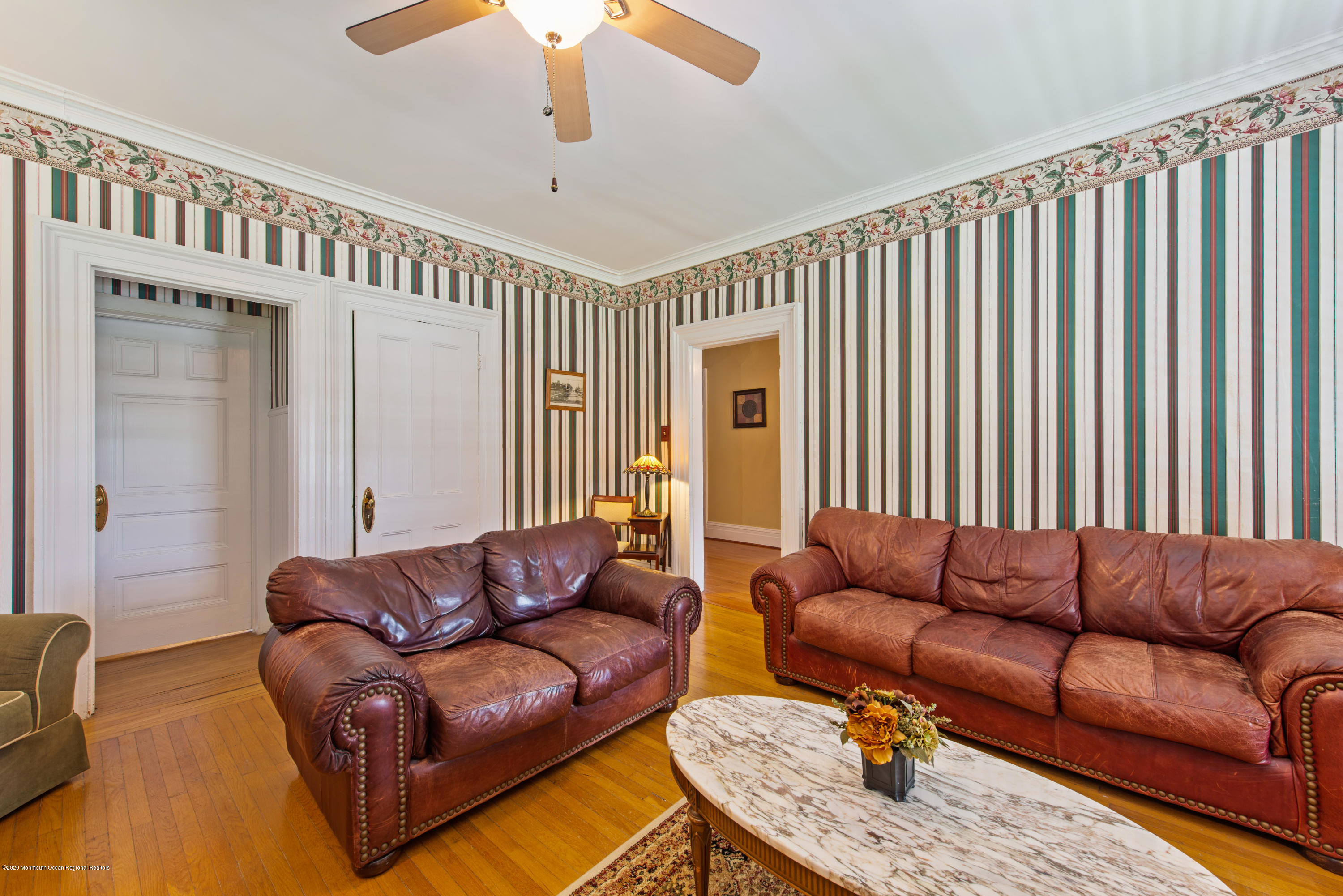 205 Main Street Keyport, NJ 07735 - Photo 23 of 42 a living room with furniture ceiling fan and a rug