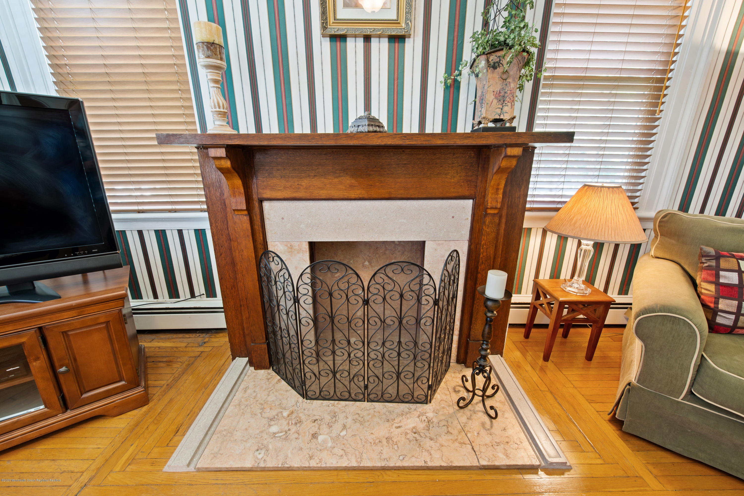205 Main Street Keyport, NJ 07735 - Photo 24 of 42 a view of living room with furniture and a fireplace