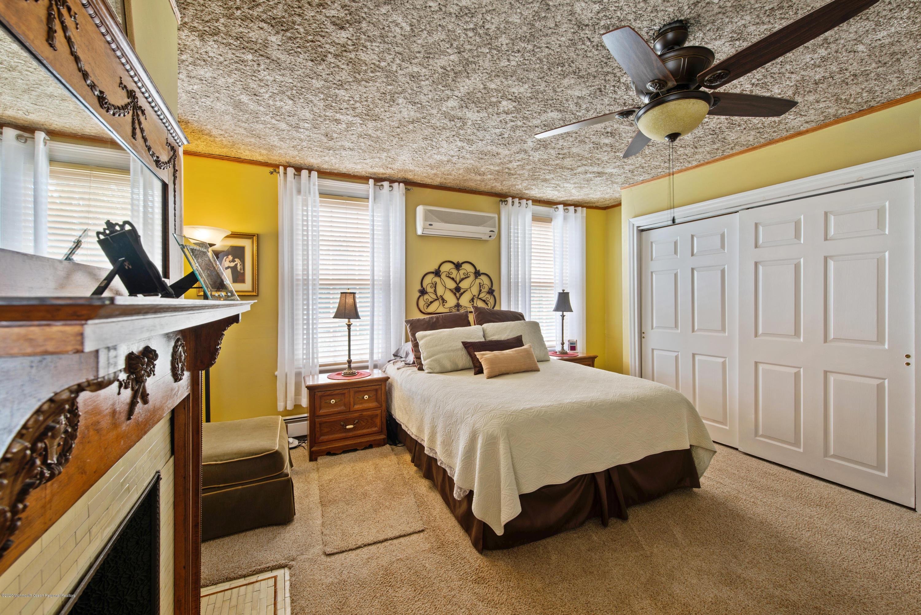 205 Main Street Keyport, NJ 07735 - Photo 28 of 42 a bedroom with a bed dresser and a window