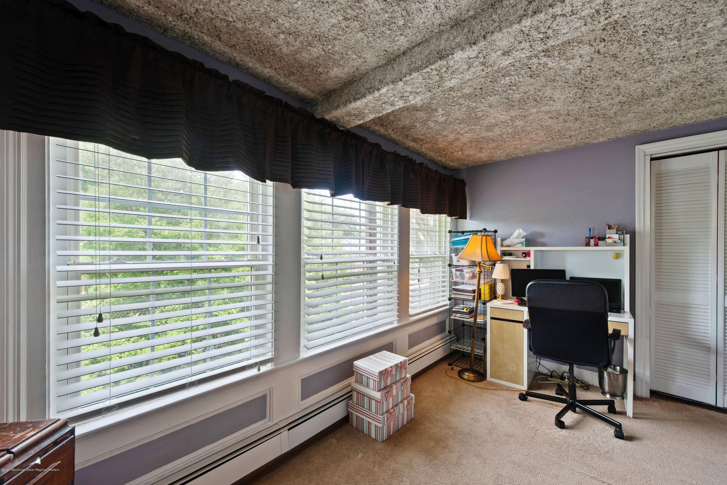 205 Main Street Keyport, NJ 07735 - Photo 31 of 42 a view of a workspace with furniture and a window