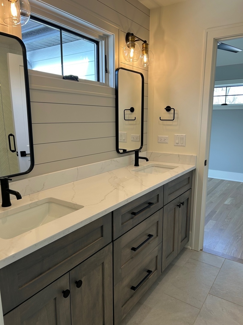 1413 Brophy Avenue Park Ridge, IL 60068 - Photo 27 of 34 a bathroom with a sink and a mirror