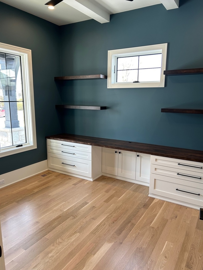 1413 Brophy Avenue Park Ridge, IL 60068 - Photo 4 of 34 a view of empty room with window and cabinet