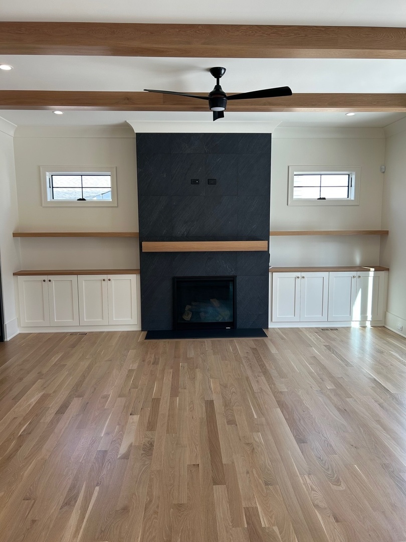 1413 Brophy Avenue Park Ridge, IL 60068 - Photo 10 of 34 a view of empty room with wooden floor and fireplace