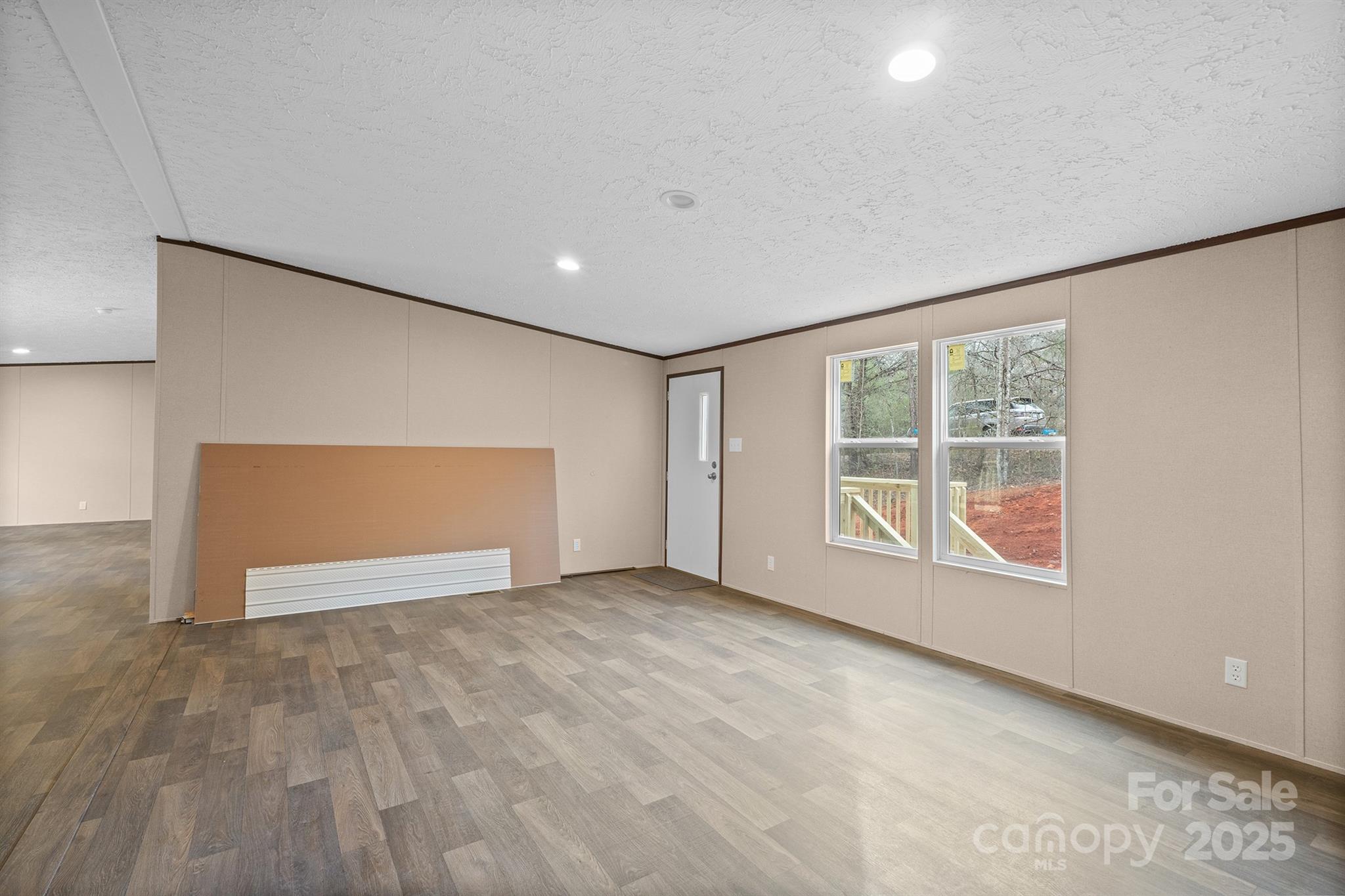 2490 Shadowbrook Drive Lenoir, NC 28645 - Photo 14 of 25 an empty room with windows