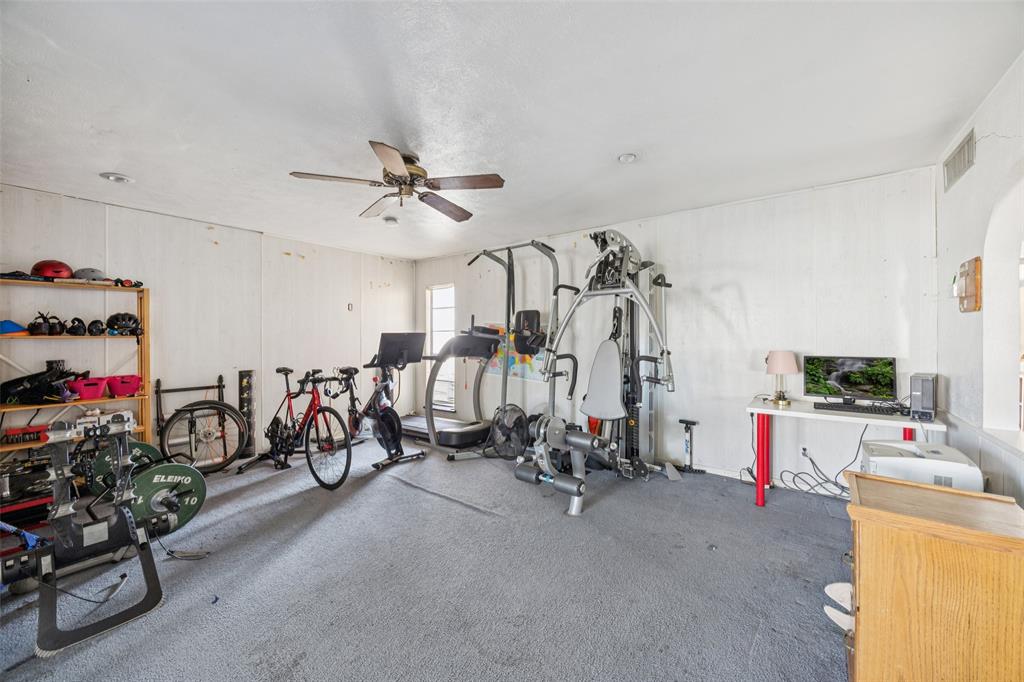 3113 Ridgemoor Drive Garland, TX 75044 - Photo 21 of 30 a view of a room with gym equipment