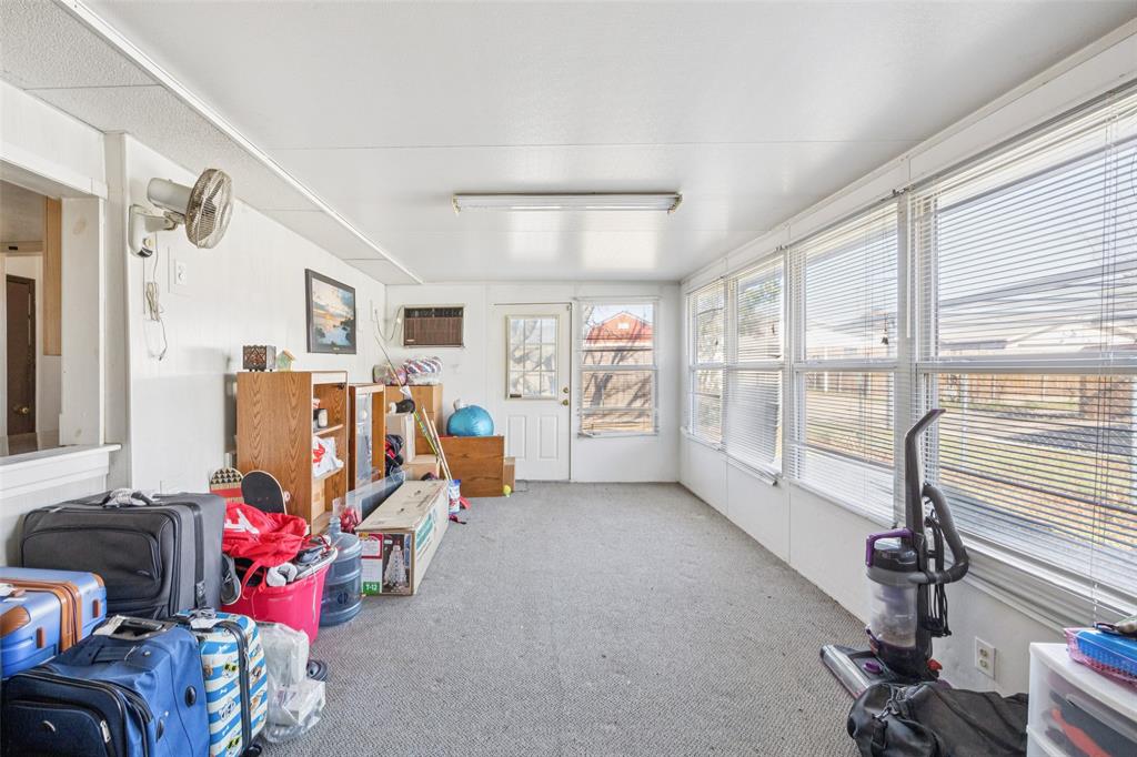3113 Ridgemoor Drive Garland, TX 75044 - Photo 24 of 30 a view of a room with gym equipment