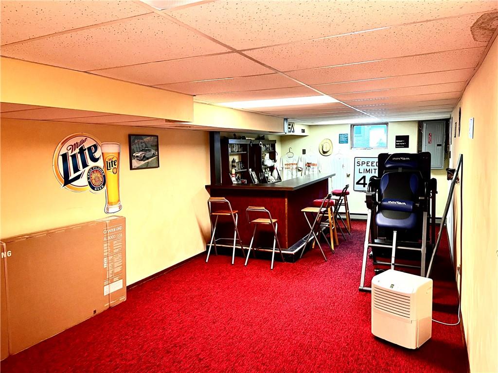 3531 Bevan Road North Versailles, PA 15137 - Photo 22 of 23 Lower-level game room leads to a second laundry area and garage.