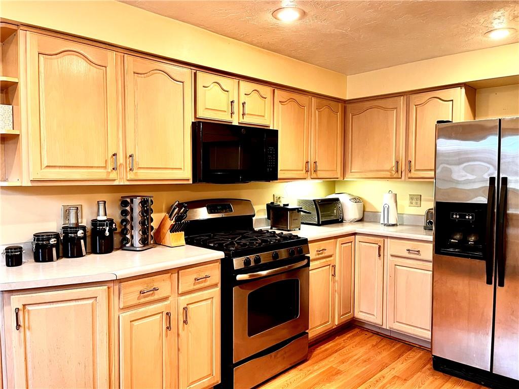 3531 Bevan Road North Versailles, PA 15137 - Photo 6 of 23 Updated kitchen with stainless steel appliances.