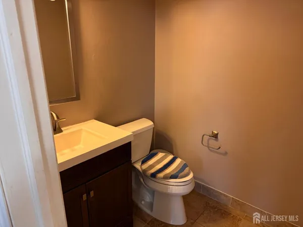 a bathroom with a sink and toilet