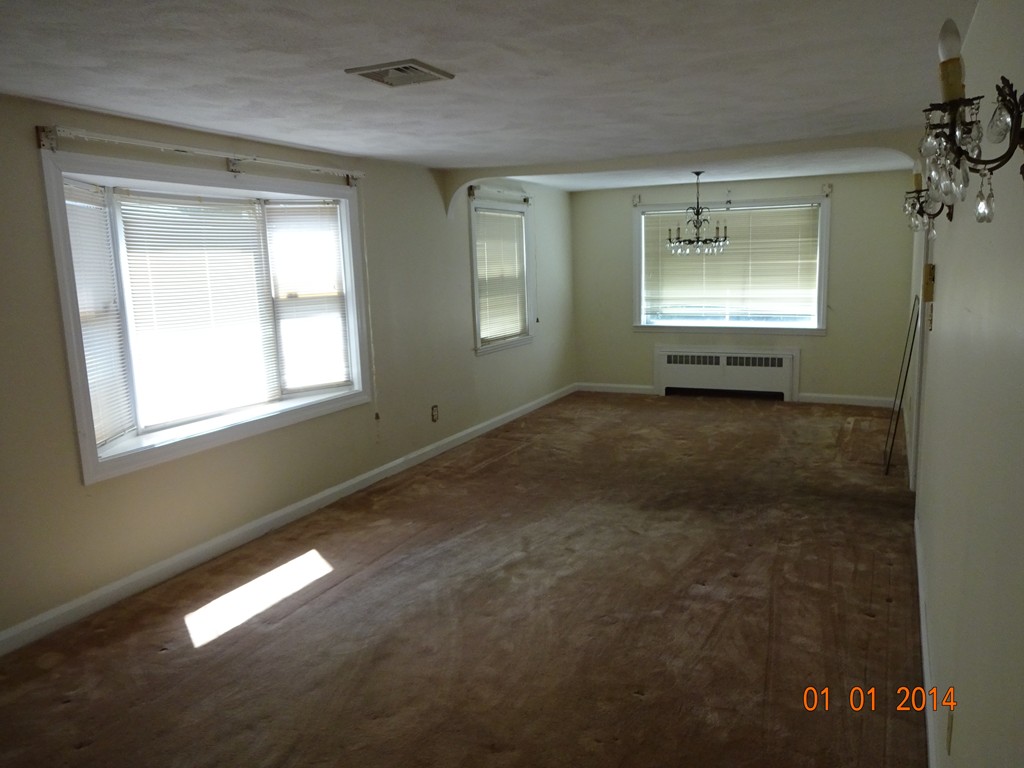 3 Sherwood Road Worcester, MA 01602 - Photo 4 of 12 a view of an empty room with a window