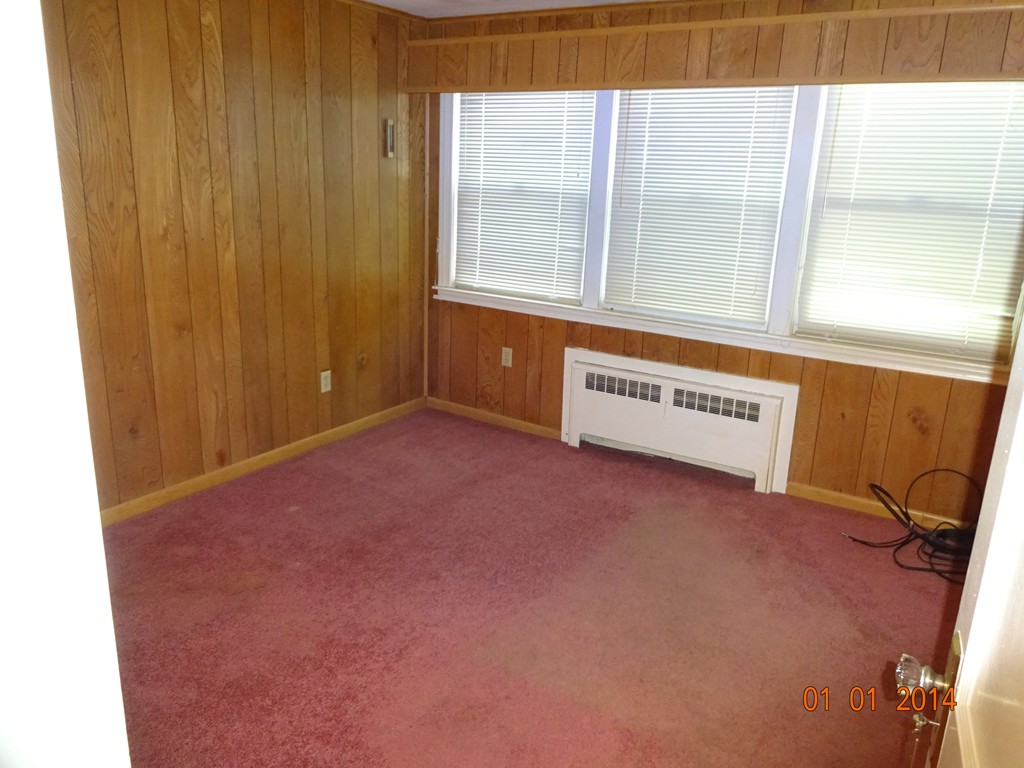 3 Sherwood Road Worcester, MA 01602 - Photo 7 of 12 a view of an empty room with a window
