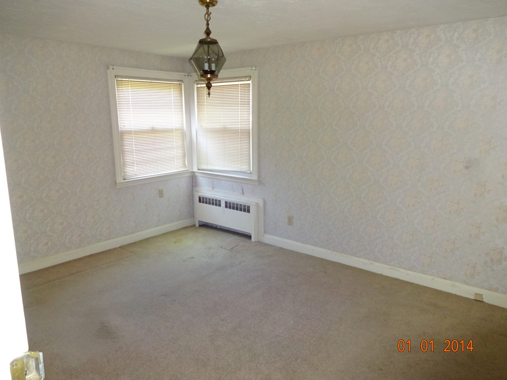 3 Sherwood Road Worcester, MA 01602 - Photo 8 of 12 an empty room with a window
