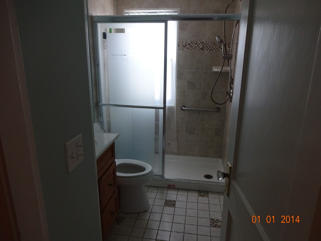 3 Sherwood Road Worcester, MA 01602 - Photo 9 of 12 a bathroom with a glass shower door