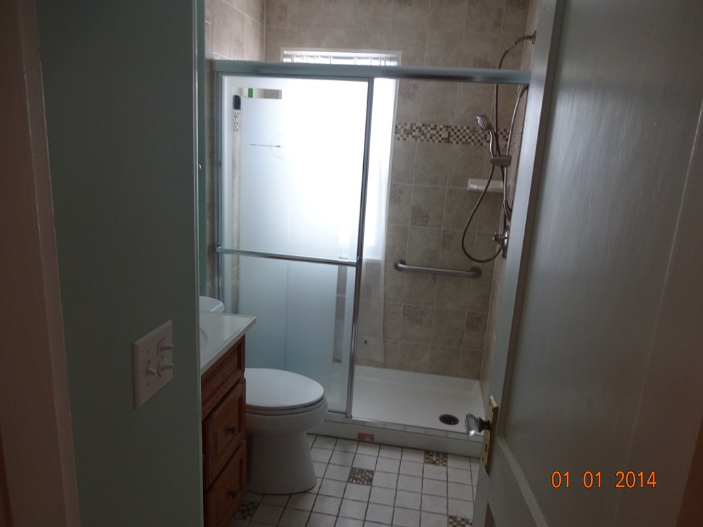 3 Sherwood Road Worcester, MA 01602 - Photo 10 of 12 a bathroom with a glass shower door
