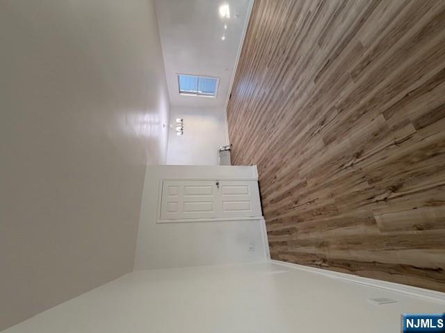 65 Barbour Street, Unit 1 Haledon, NJ 07508 - Photo 1 of 18 a view of empty room with wooden floor