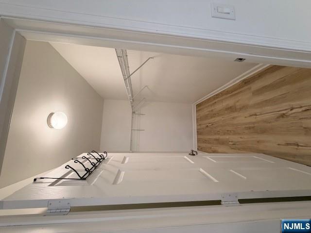 65 Barbour Street, Unit 1 Haledon, NJ 07508 - Photo 14 of 18 a view of a room with wooden floor