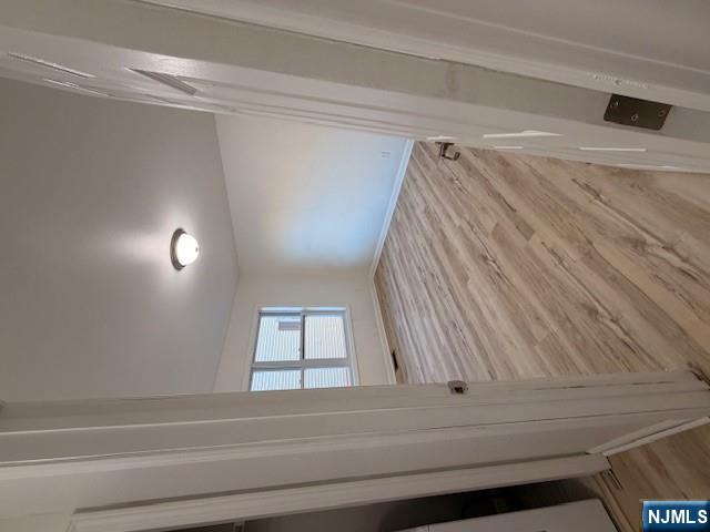 65 Barbour Street, Unit 1 Haledon, NJ 07508 - Photo 15 of 18 a room with a wooden door and door