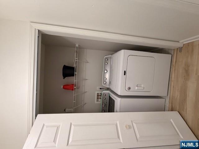 65 Barbour Street, Unit 1 Haledon, NJ 07508 - Photo 9 of 18 a utility room with dryer and washer