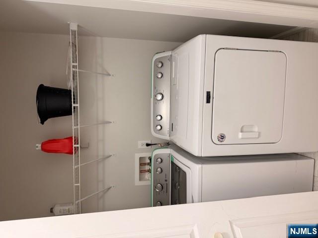 65 Barbour Street, Unit 1 Haledon, NJ 07508 - Photo 10 of 18 a utility room with dryer and washer