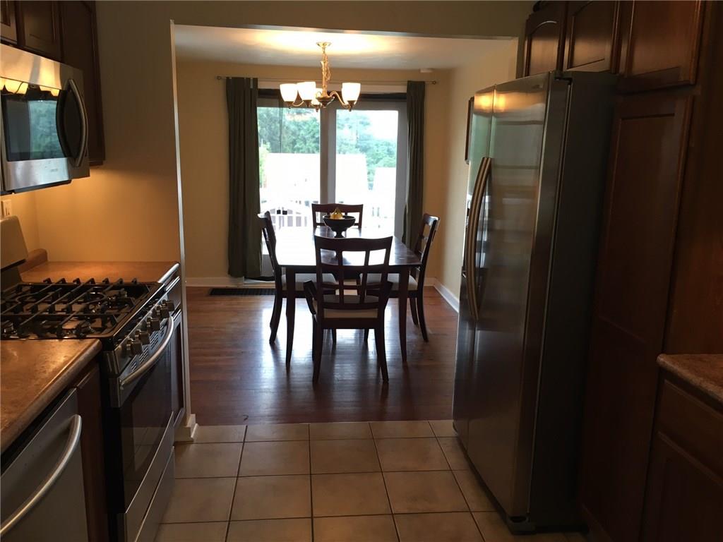 3724 Middleboro Road Castle Shannon, PA 15234 - Photo 12 of 25 The open kitchen and dining room are perfect for your entertaining needs!