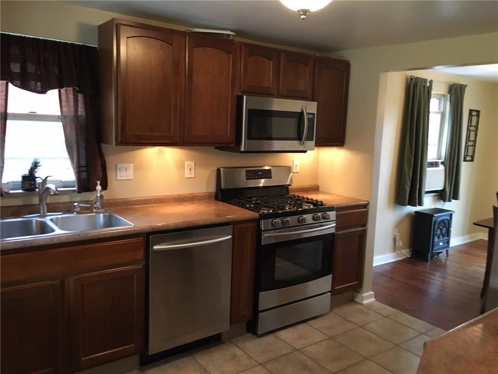 3724 Middleboro Road Castle Shannon, PA 15234 - Photo 8 of 25 The gorgeous kitchen comes equipped with stainless steel appliances.