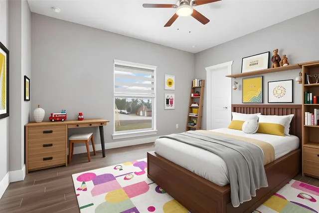 a bedroom with a bed and painting on the wall