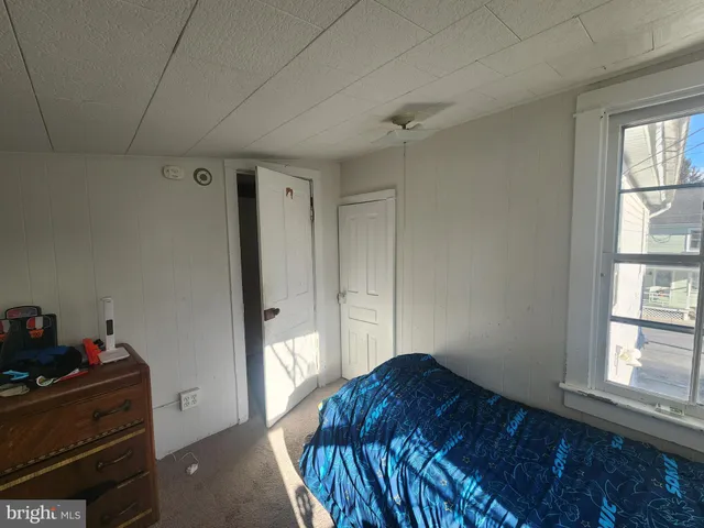 a living room with furniture and window