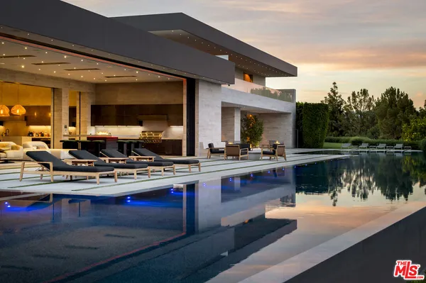 a kitchen with a stove and cabinets