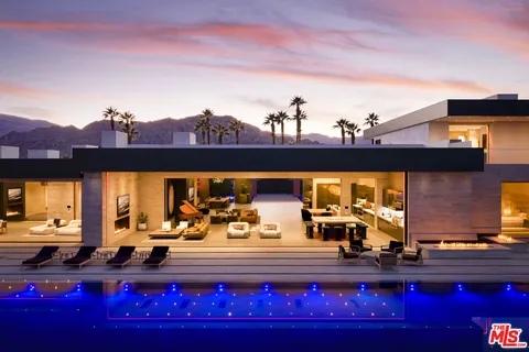 a view of a living room with furniture