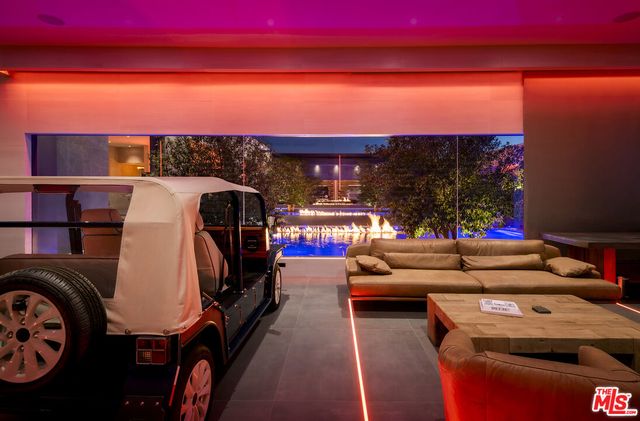 a view of city from balcony with furniture