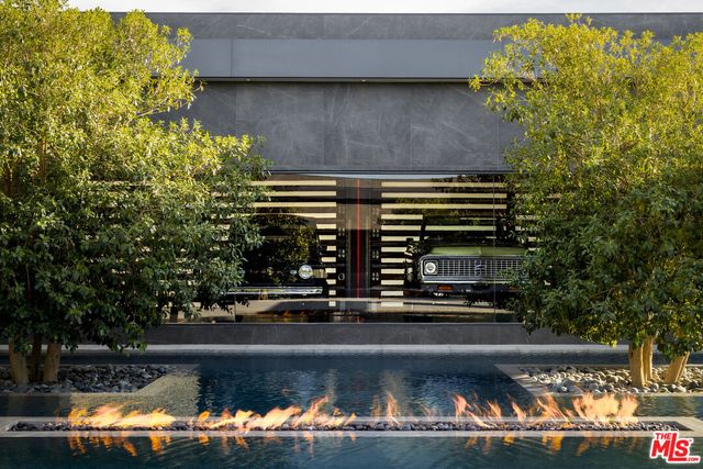 a view of swimming pool with outdoor seating