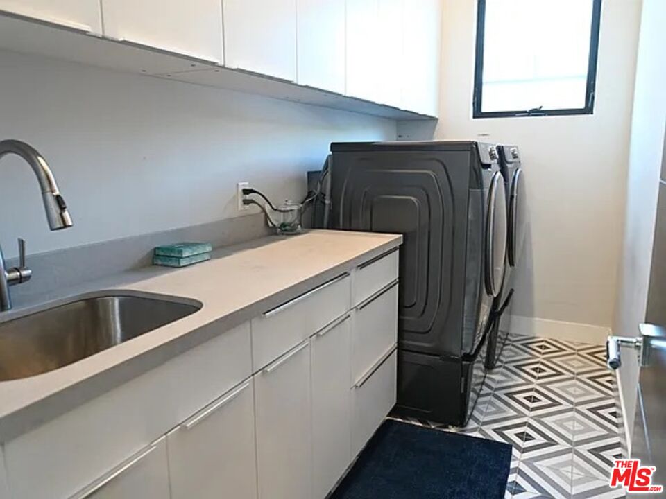 1410 Coronado Terrace Los Angeles, CA 90026 - Photo 22 of 27 a close view of sink and tap