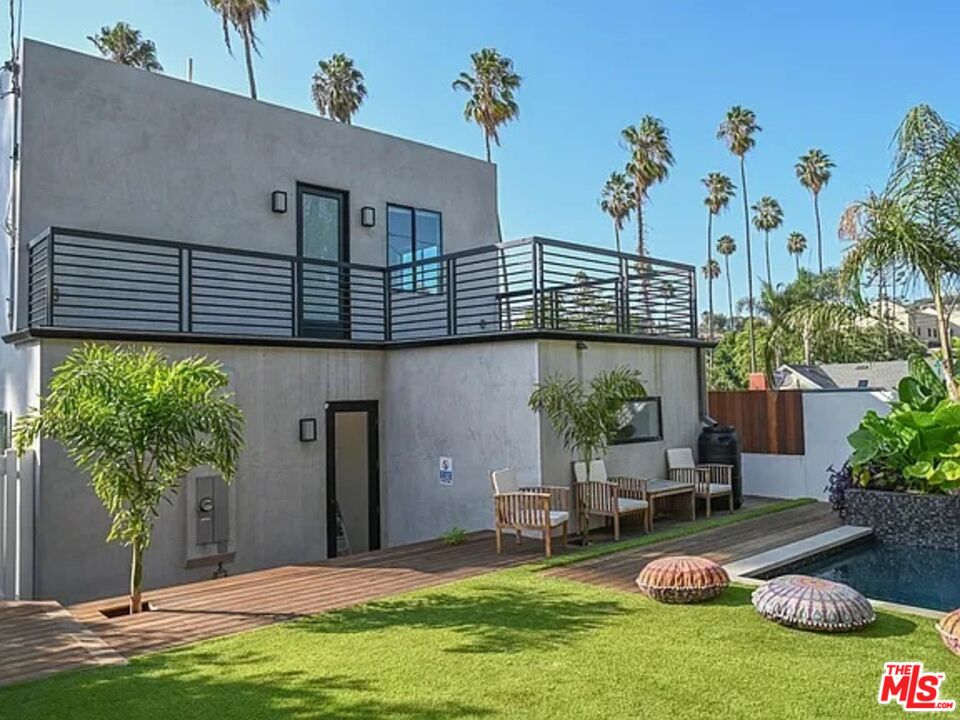 1410 Coronado Terrace Los Angeles, CA 90026 - Photo 24 of 27 a view of a house with backyard and sitting area
