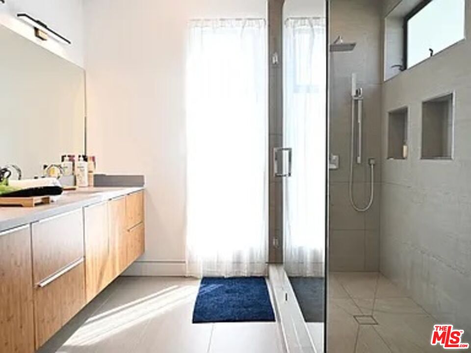 1410 Coronado Terrace Los Angeles, CA 90026 - Photo 8 of 27 a kitchen with a sink and a refrigerator
