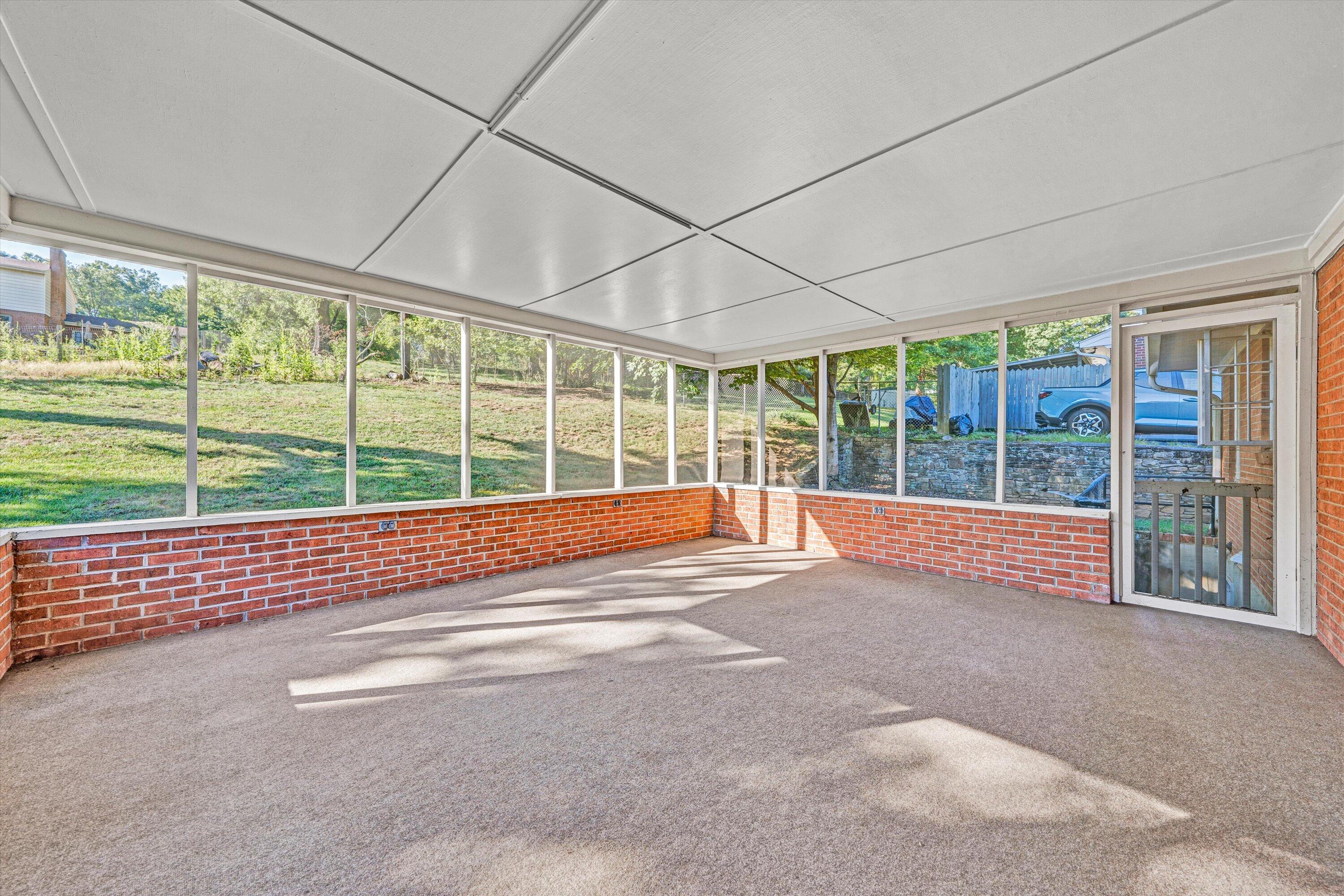 3008 Lofton Road Roanoke, VA 24018 - Photo 14 of 52 a view of an empty room with a balcony