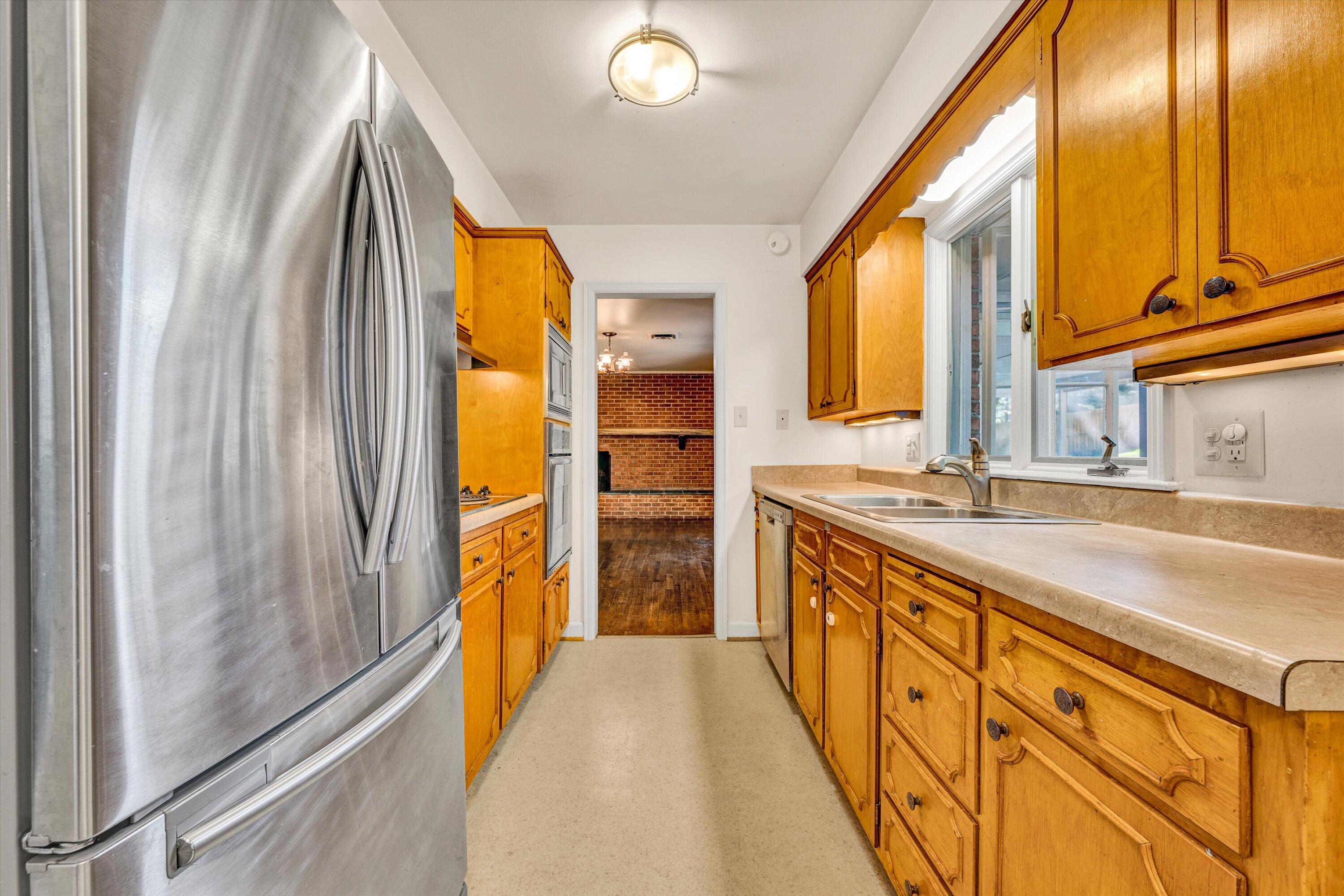 3008 Lofton Road Roanoke, VA 24018 - Photo 20 of 52 a bathroom with a granite countertop sink and a large mirror