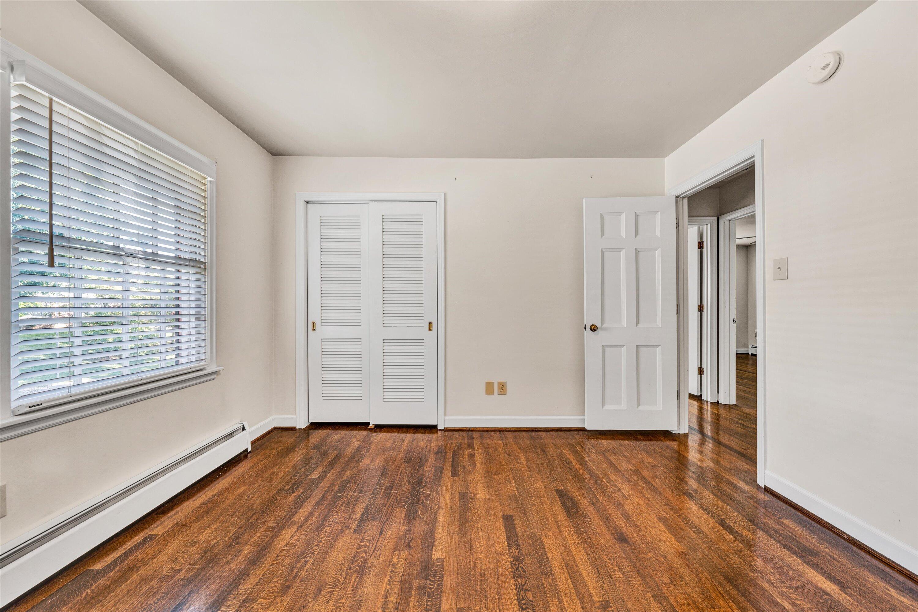3008 Lofton Road Roanoke, VA 24018 - Photo 26 of 52 a view of empty room with wooden floor and fan