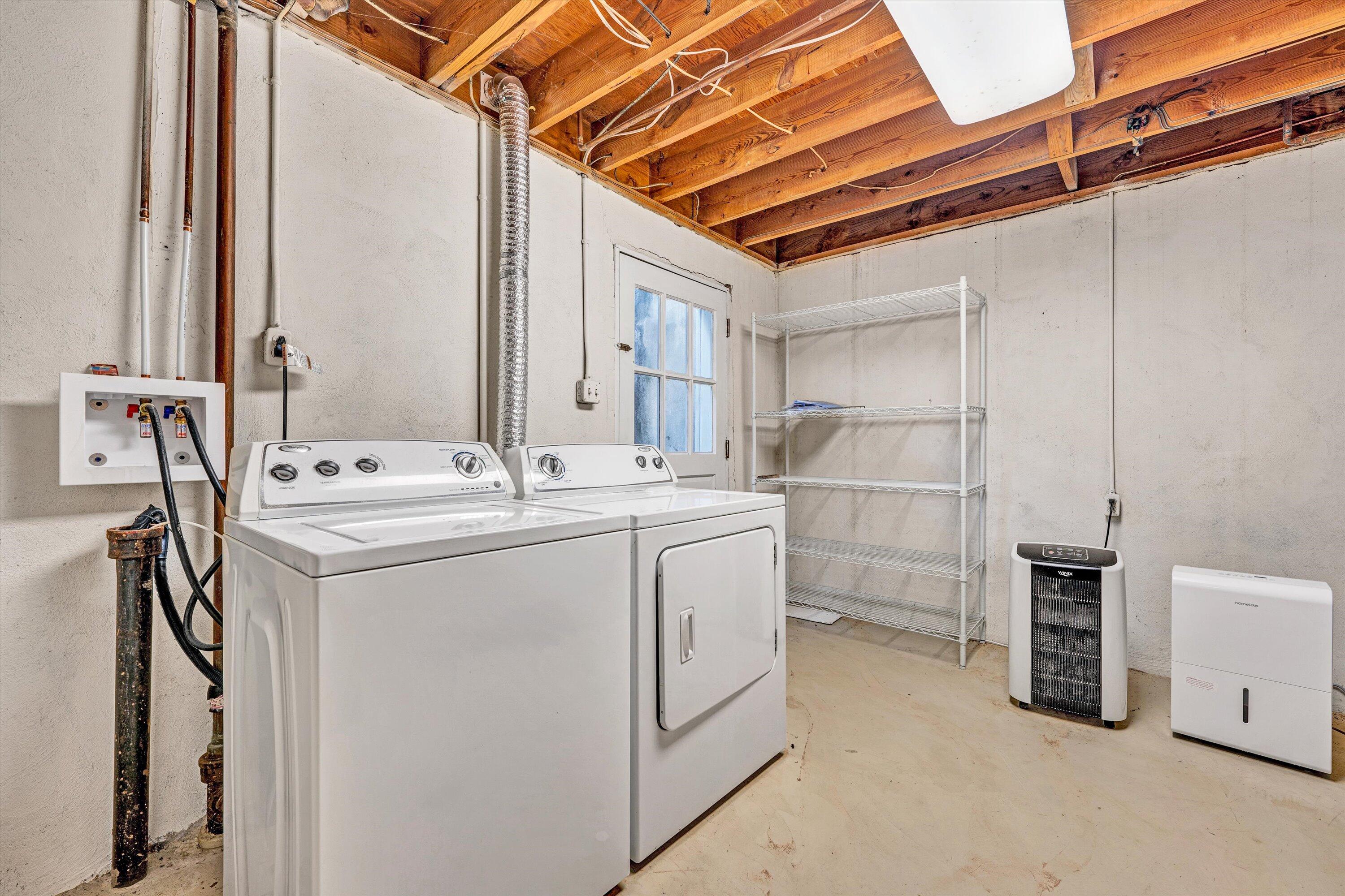 3008 Lofton Road Roanoke, VA 24018 - Photo 40 of 52 a utility room with cabinets dryer and washer