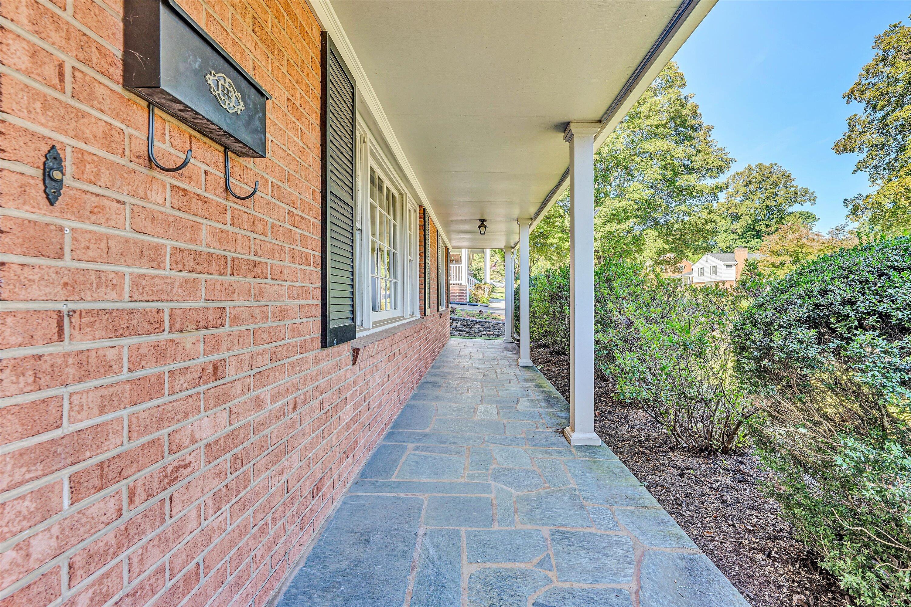 3008 Lofton Road Roanoke, VA 24018 - Photo 4 of 52 a view of a pathway both side of house