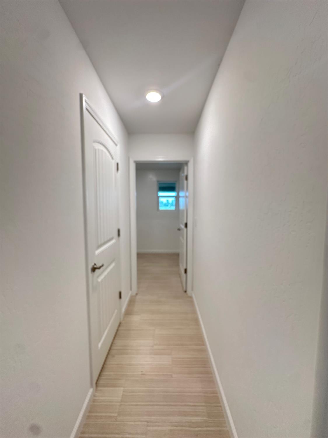 20568 Road 31 Madera, CA 93638 - Photo 11 of 24 a view of a hallway