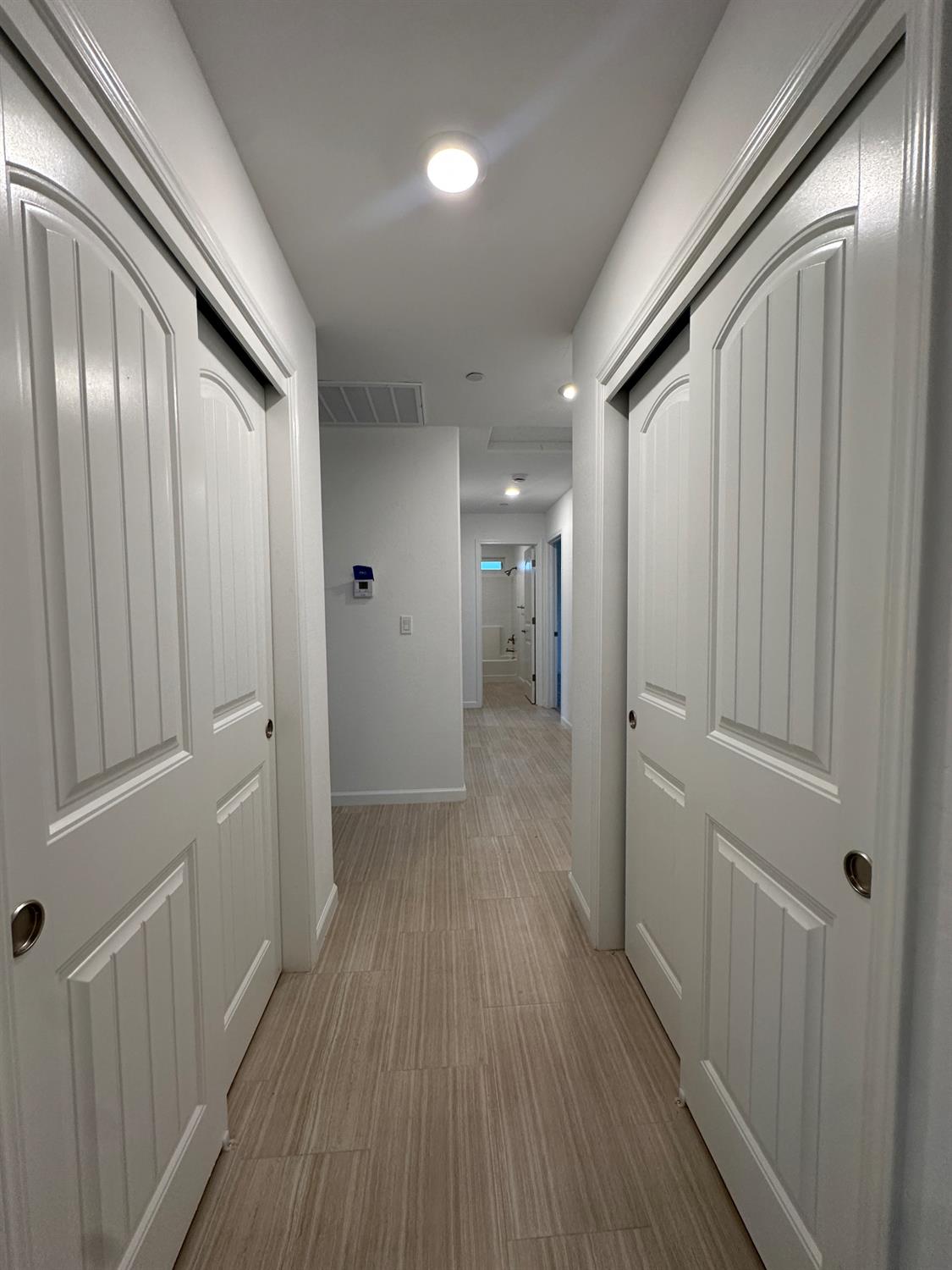 20568 Road 31 Madera, CA 93638 - Photo 18 of 24 a view of a hallway with wooden floor