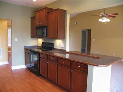 520 Raven Road Versailles, KY 40383 - Photo 10 of 16 Built in bar keeps the cook in the actio