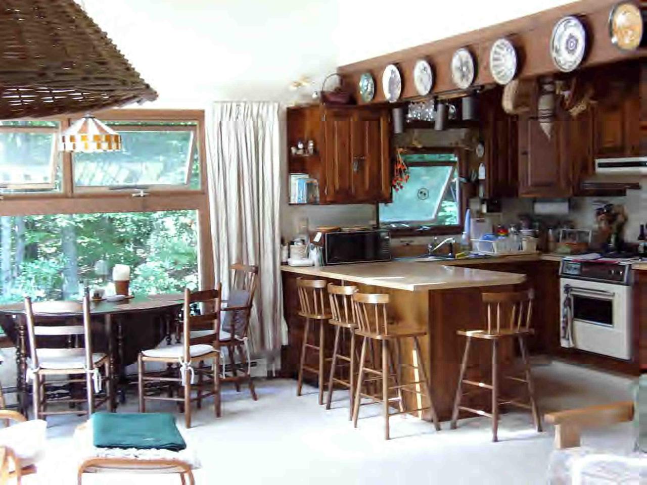 252 Fox Den Road Tolland, MA 01034 - Photo 2 of 6 a view of a chairs and tables in a patio