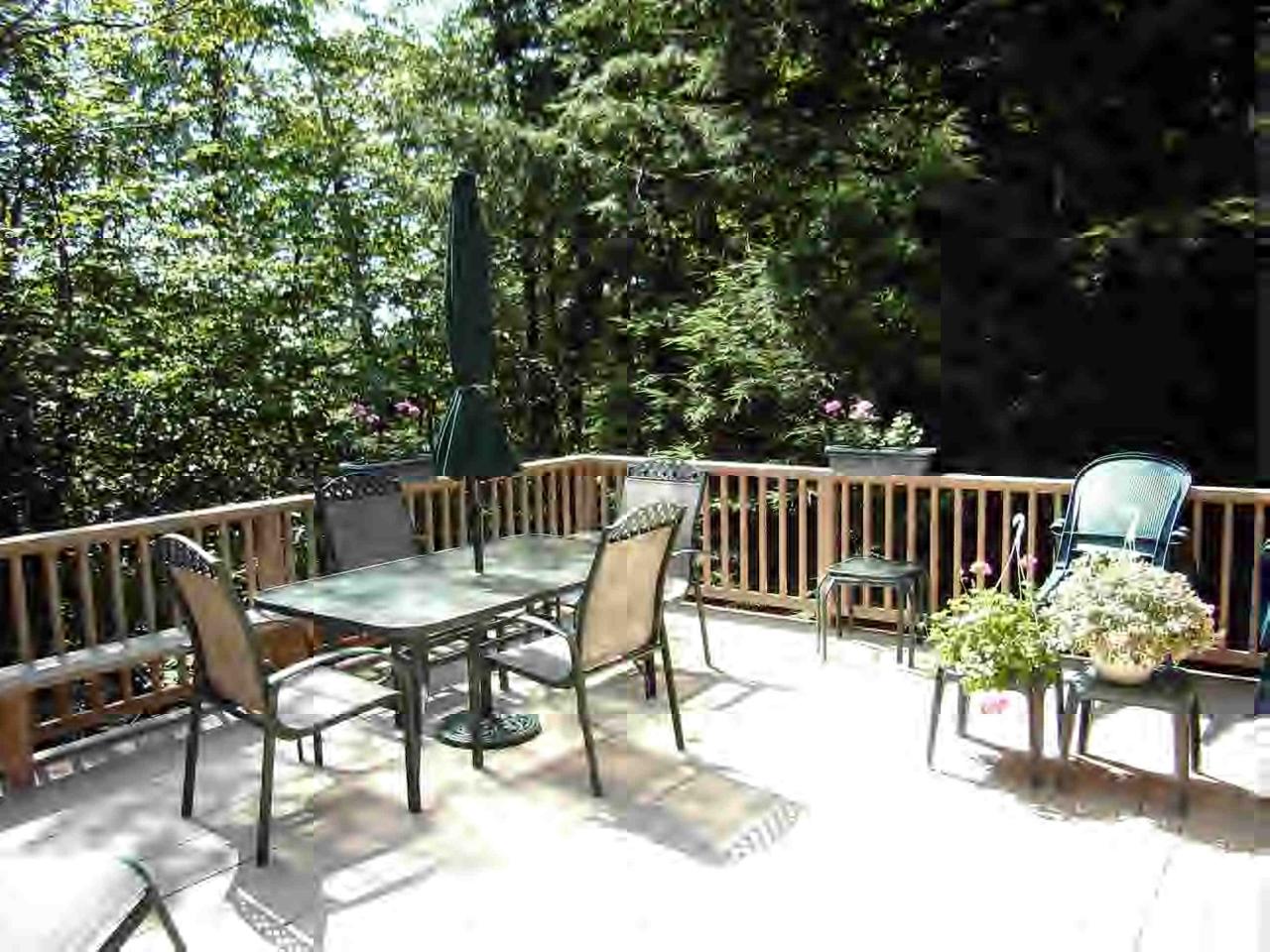 252 Fox Den Road Tolland, MA 01034 - Photo 3 of 6 a view of a chairs and table in the roof deck