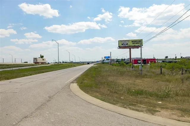 a view of a golf course with a lake